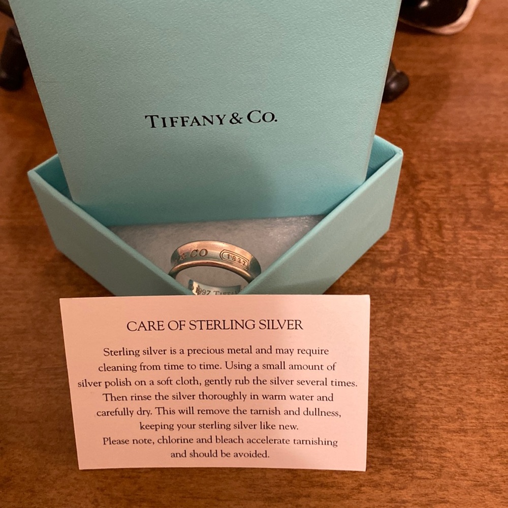 Tiffany & Co. sterling silver Ring with original pouch and box.